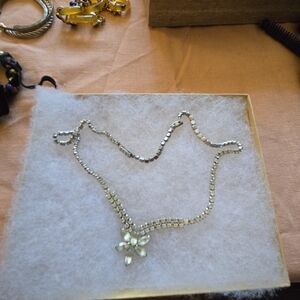 Elegant Silver Necklace with Floral Pendant